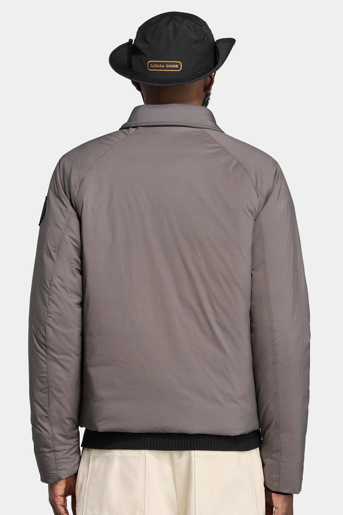Lodge Coach Jacket Black Disc - Coastal Grey 811 - on_back_01